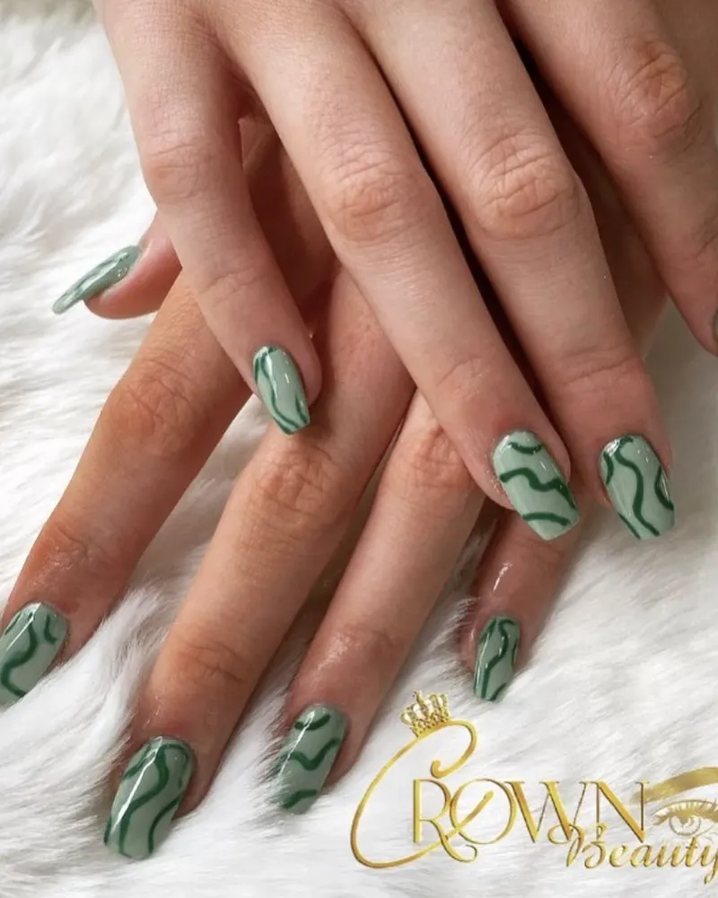 Sage green swirl nail art